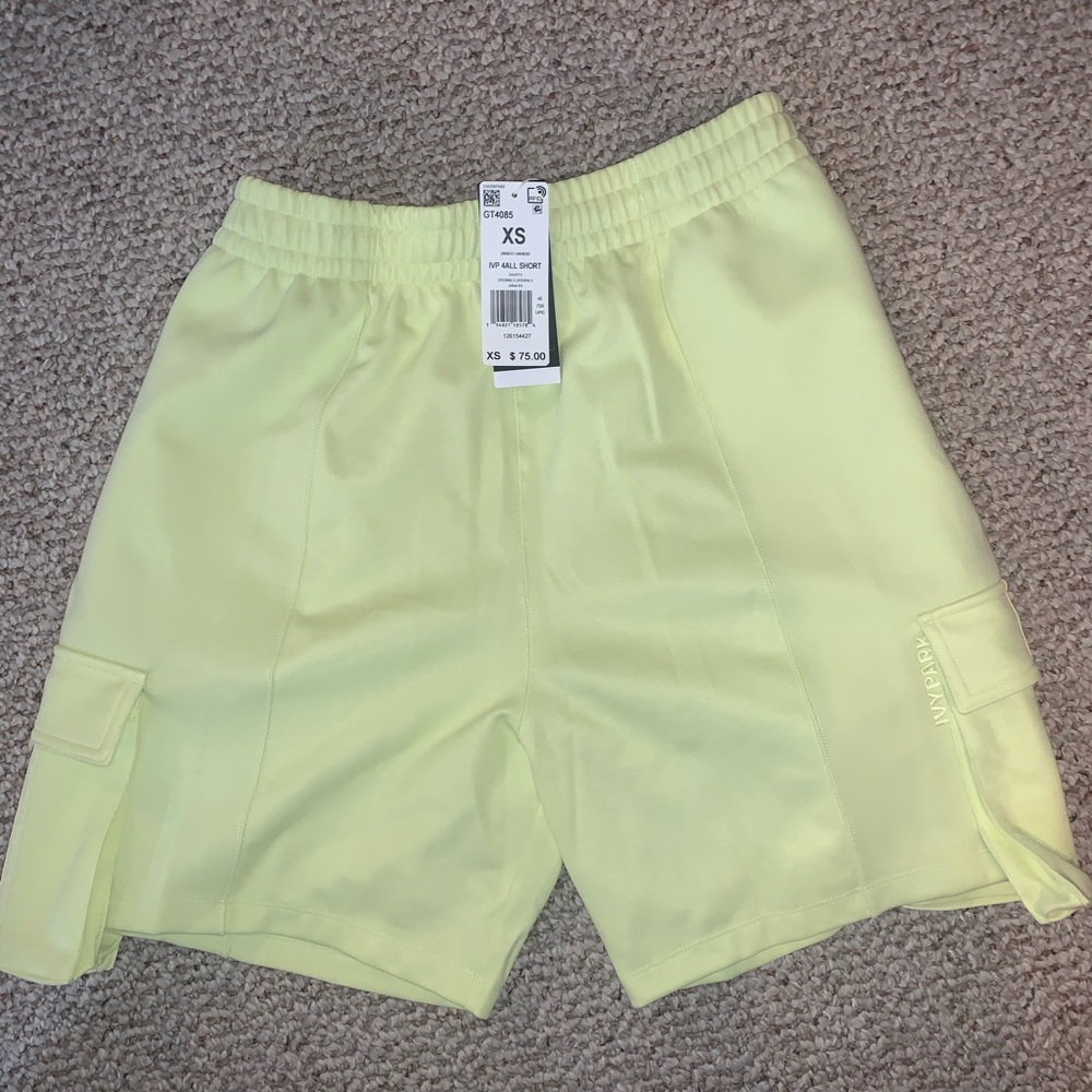 Ivy Park unisex yellow shorts